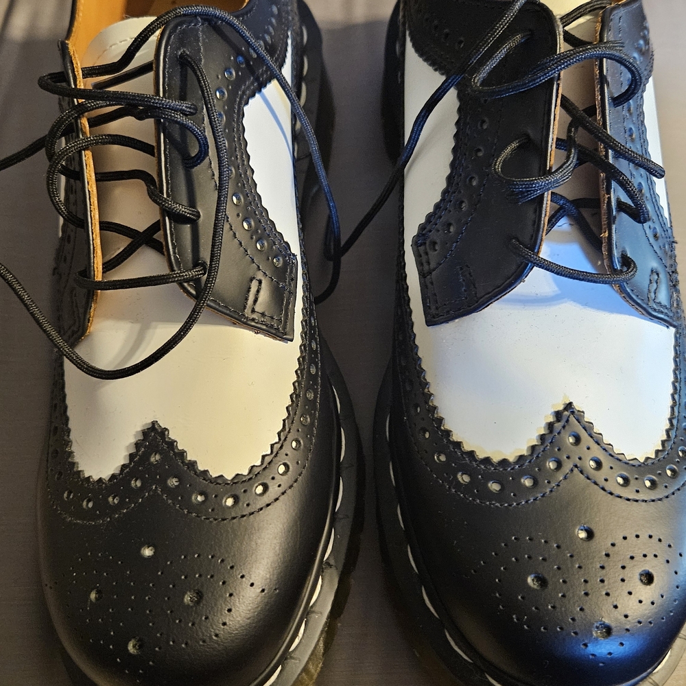 Dr. Martens Black and White Brogue Flats